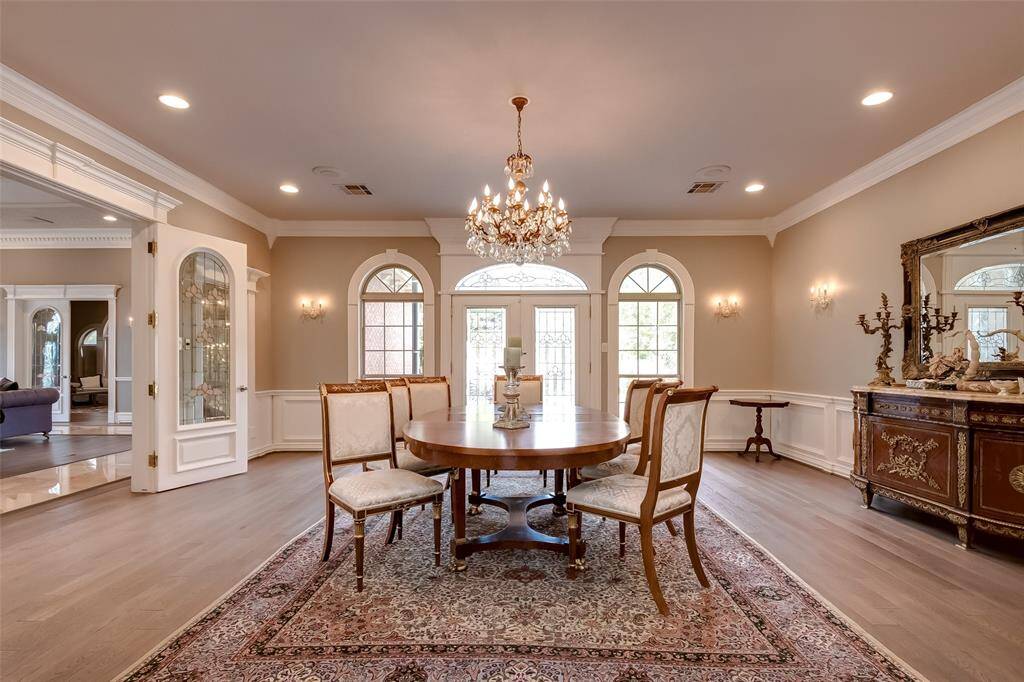 Spacious dining room accommodates a table for 12.