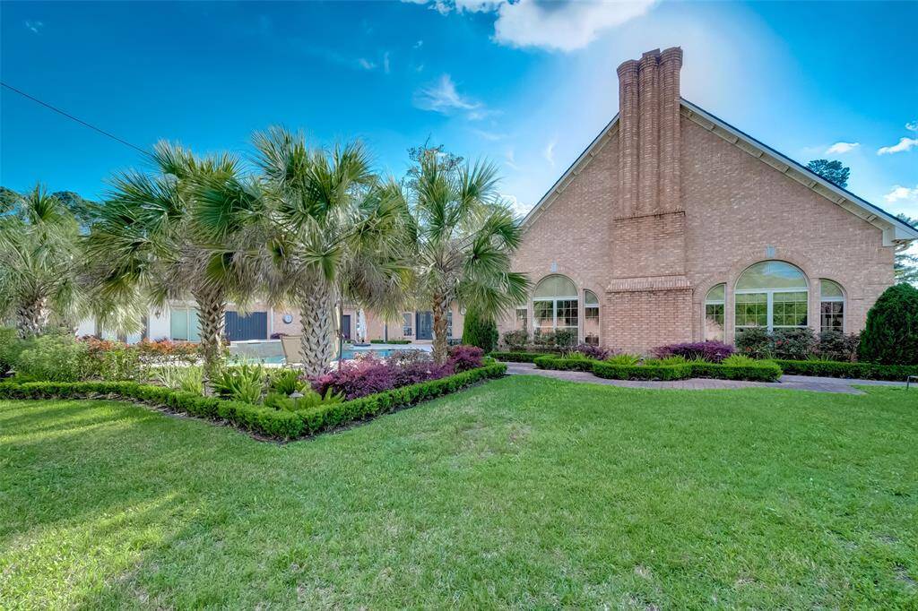 Expansive lawn perfect for recreation and gatherings.