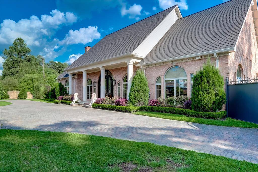 Secure yard with three electric gates for enhanced privacy and convenience.
