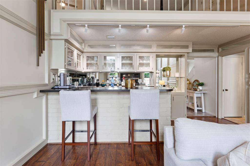 Enjoy a cocktail from your very own wet bar.
