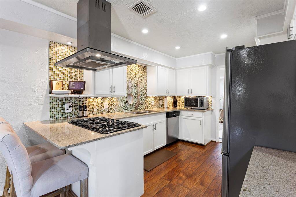Another view of the kitchen