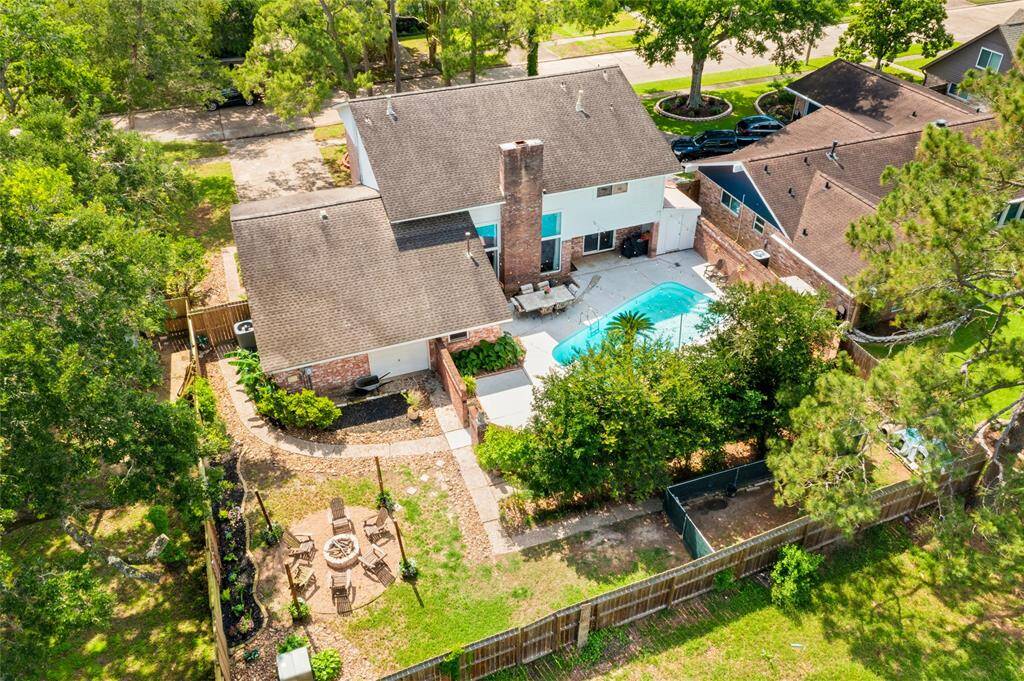 9,600 Square foot lot with inground pool, tanning deck and dedicated firepit area - all perfect for entertaining.