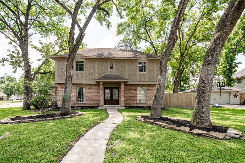 Large corner lot in established community!