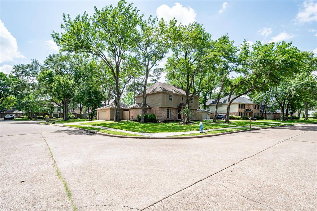 Call this oversized corner lot home today!