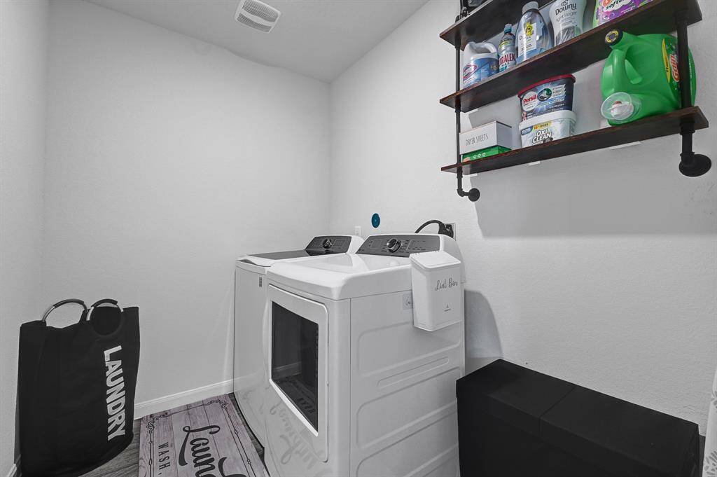 Laundry room on first floor providing a functional space for household chores.