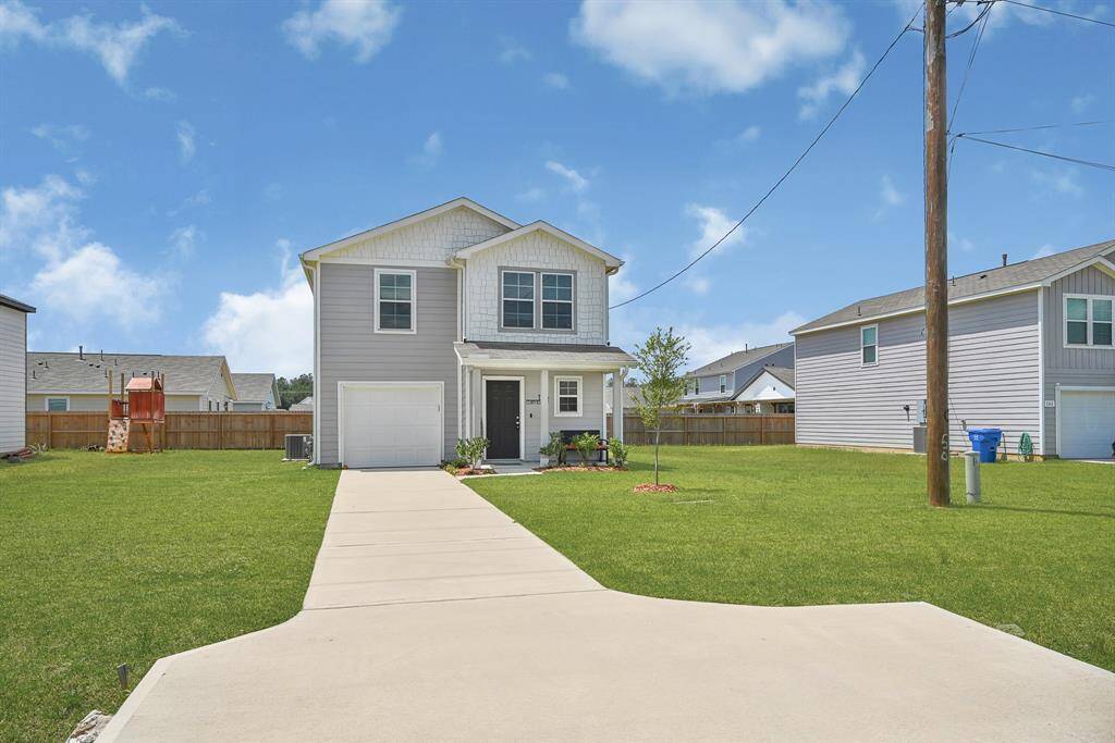 Charming two-story home with a modern exterior, single garage, and spacious front yard. Located in a quiet neighborhood with plenty backyard, ready to make it your own!