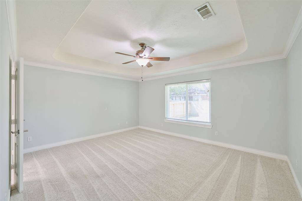 Primary suite features huge bedoom. Bring in your kingsize furniture. Note the ceiling design. Like new carpet in all bedrooms.