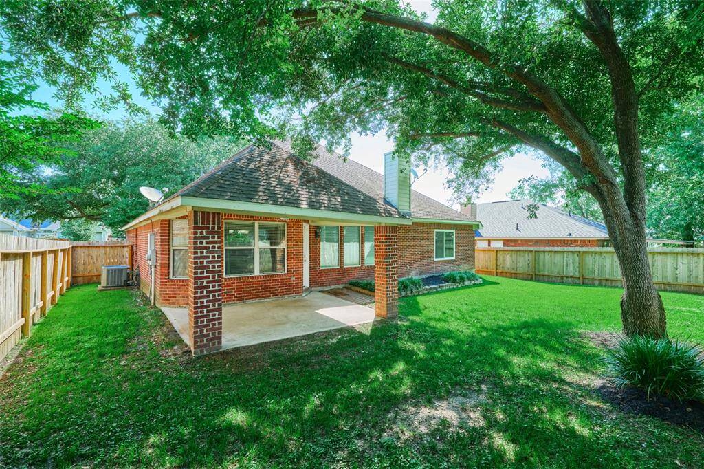 Nice size backyard w/covered back patio.  The backyard is fenced & the fence is approx. 2 years old.