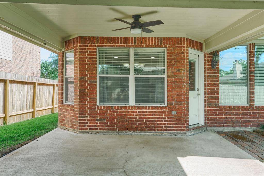 Wonderful covered back patio.  Patio slab is a separate pour from the main slab. Over time back patio settled.  Seller had engineering company evaluate  &  foundation company leveled patio & seller had them add piers to correct main foundation settling for peace of mind.  THERE IS A LIFETIME TRANSFERRABLE WARRANTY