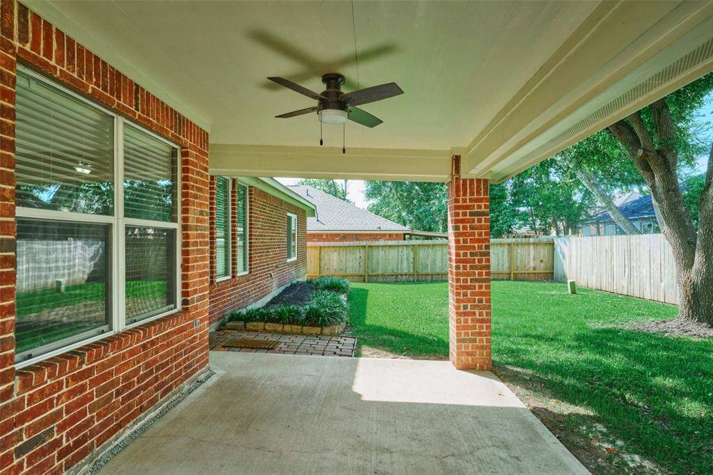 Close up of covered back patio.   The home is all brick.  Enjoy all the amenities Walden has to offer - Waterside pool, Yacht club, tennis & pickle ball failities, fitness center, boat ramps, walking & bike trails, kids & dog parks, baseball/soccer fields & golf memberships are available.