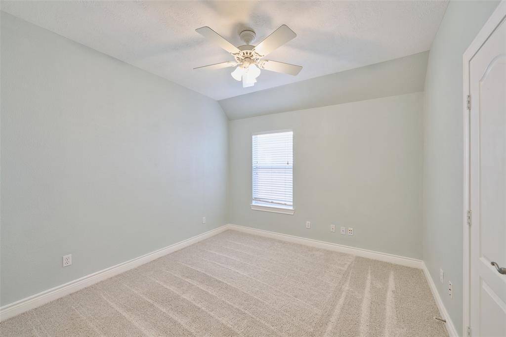 Guest bedroom 1.  This home is in pristine condition & ready for immediate move in.