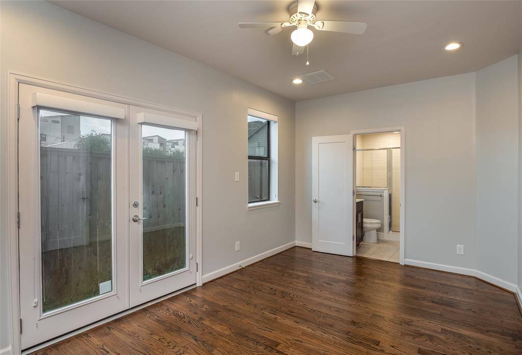 Frist floor secondary bedroom with backyard access.