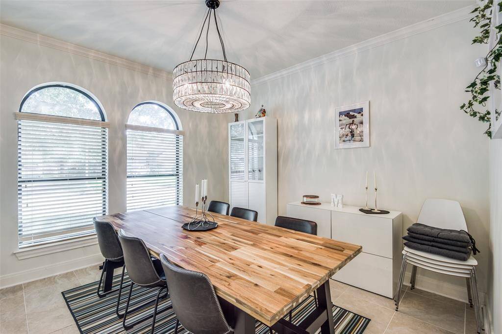 Elegant formal dining room with plenty of natural sunlight.