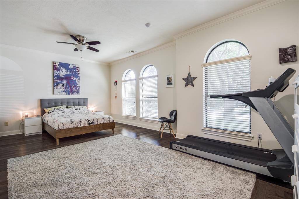 Located directly to the right of the foyer is the generously sized primary bedroom retreat with an abundance of natural light. Not pictured to the left is the generously sized en-suite bathroom featuring a large walk-in closet, double sink vanity, as well as a separate shower and soaking tub!