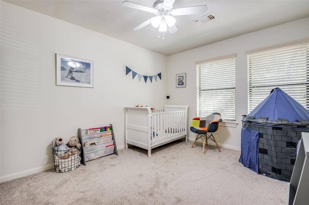 To the left of the sitting area located at the top of the stairs you will find bedrooms no. 3 and 4 along with their shared Hollywood bathroom. Pictured here is bedroom no. 3 with access to the bathroom on the right (not shown.)