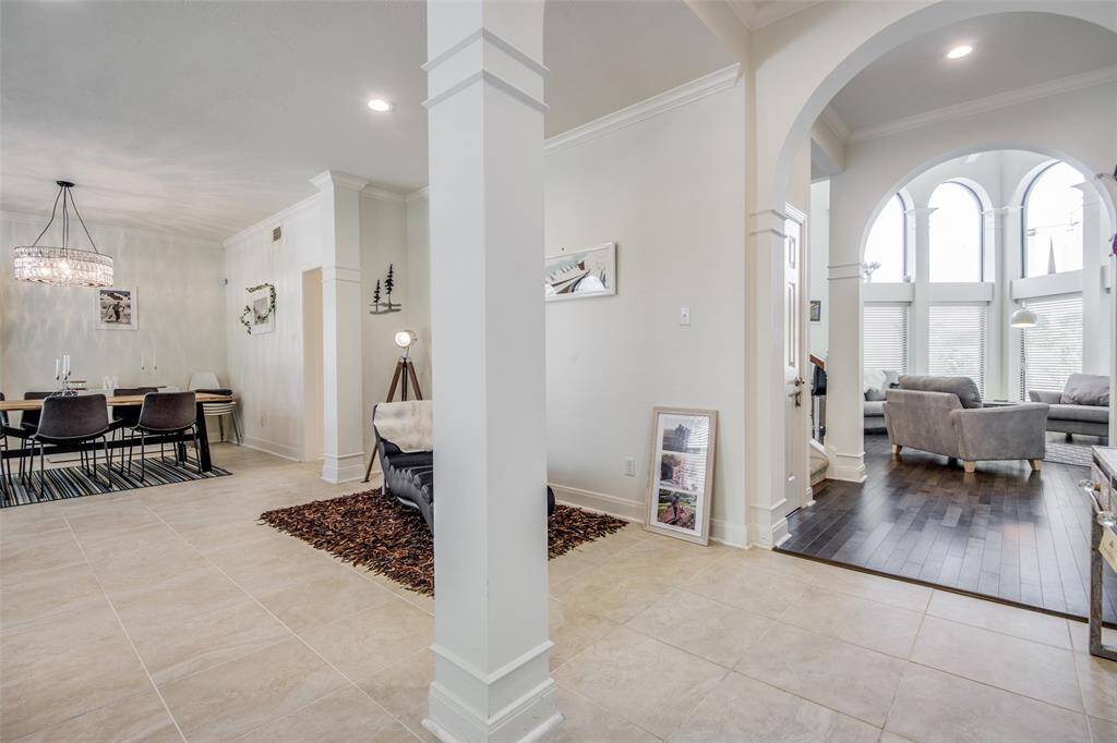 As you walk in the home, there is a 2 story foyer leading to the formal to the left and straight ahead to the family room. Classic elegance throughout!