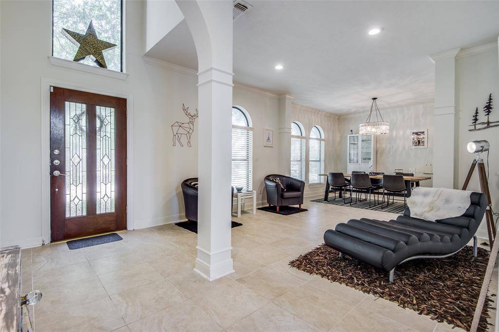 Another view of the formal living leading into the dining area.