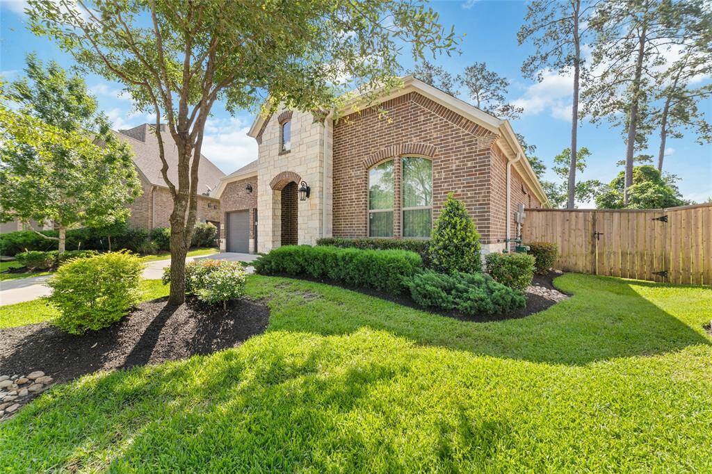 Beautifully landscaped and well cared for, this home is situated in a quiet culdesac with no neighbors in the back.