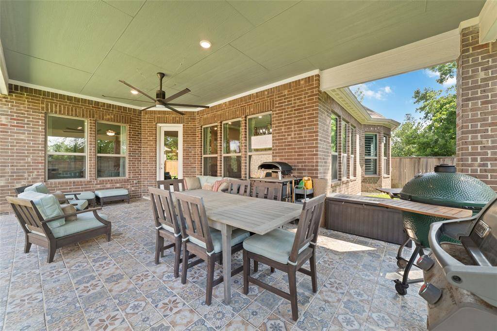 You'll be delighted at just how spacious and functional the back patio actually is. Owners added gutter guards and a mosquito misting system, making this space truly enjoyable.
