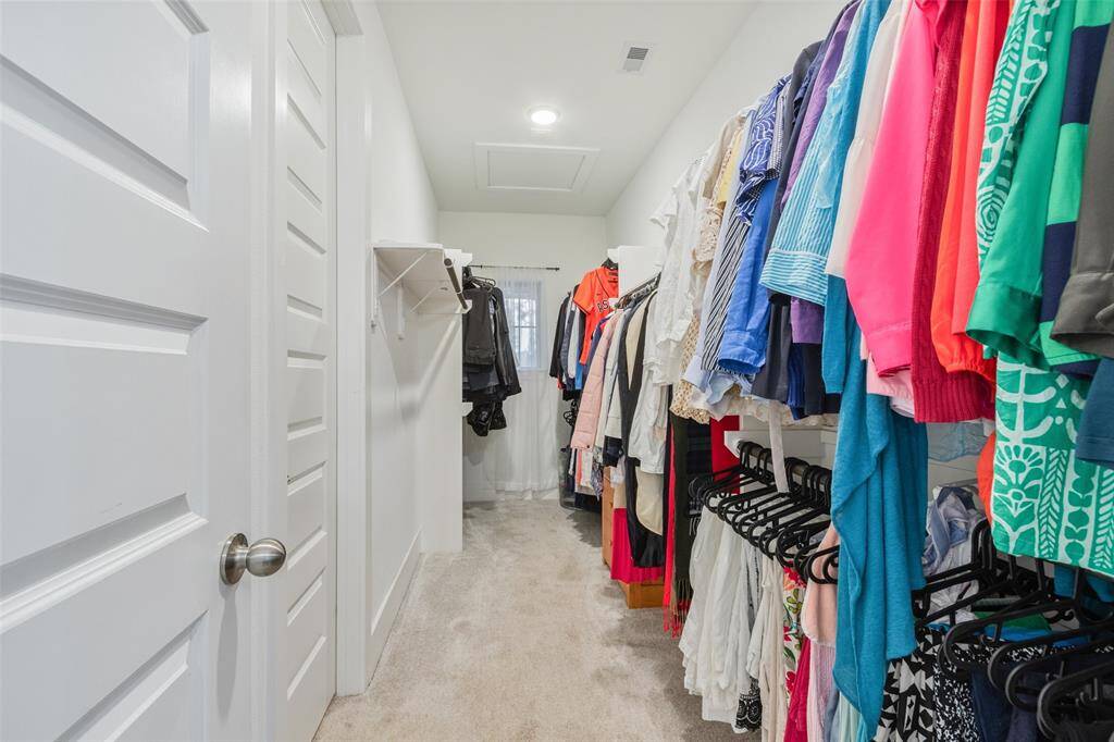 A large walk in closet is conveniently located off the Primary Bathroom.