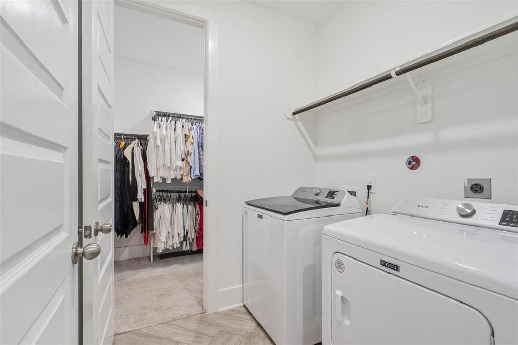 The laundry room is conveniently located on the first floor with access from the primary closet or the Hallway.