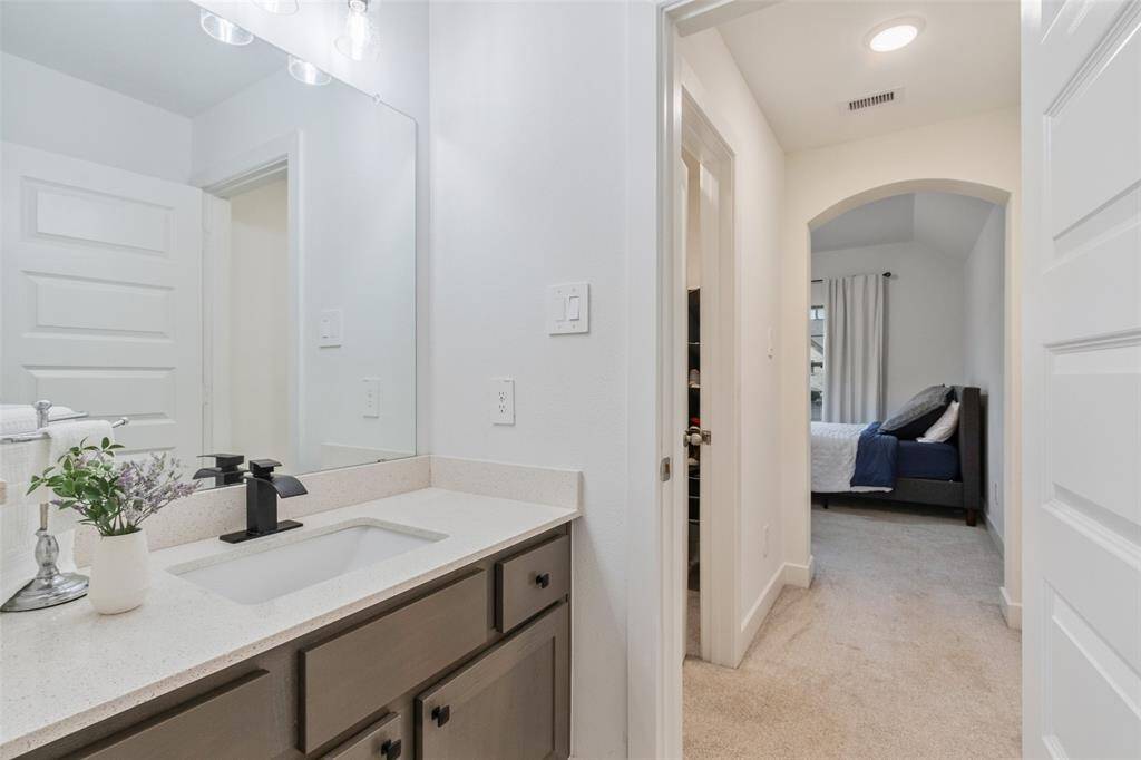 Private bathroom for Bedroom 3 on the second floor.