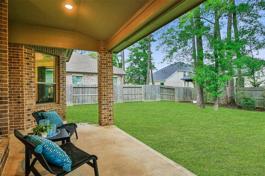 Great backyard with lush landscaping.