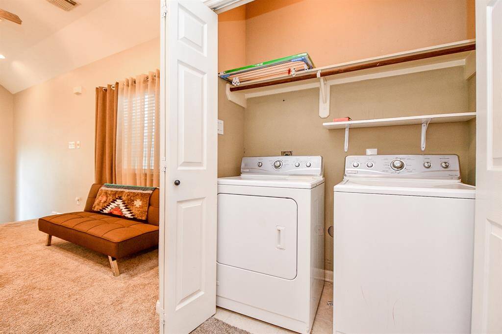 Utility room conventional located upstairs between bedrooms. Large storage closet just across the utility room.