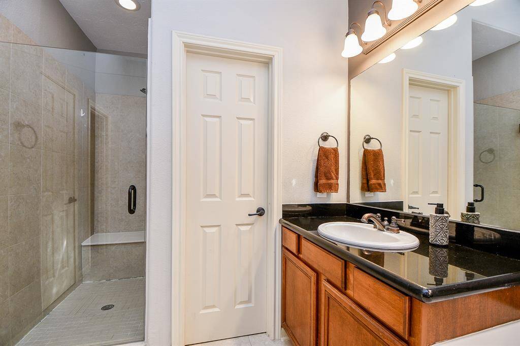 The door leads to one of the walk-in closets.