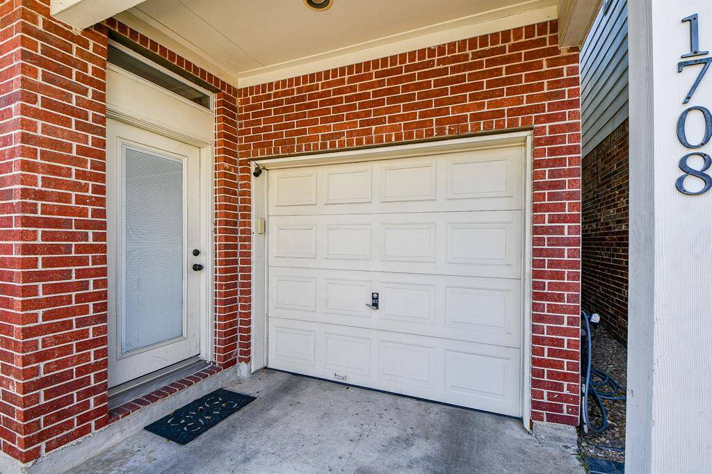 The single car garage is at the end of Aden Mist Drive. Don't miss the garage pulley storage system and epoxy floor finish.