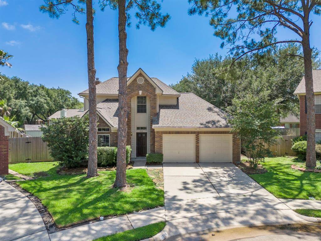 Charming two-story brick home located in Clear Lake City's Bay Glen subdivision.