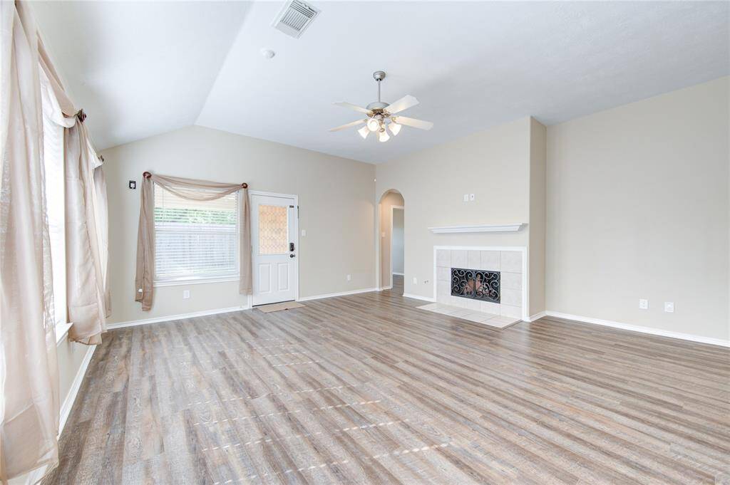 large living space with fireplace