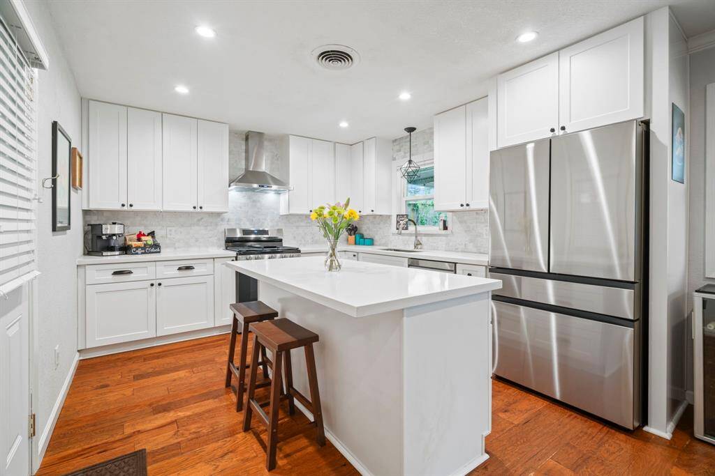 Stainless steel appliances in kitchen