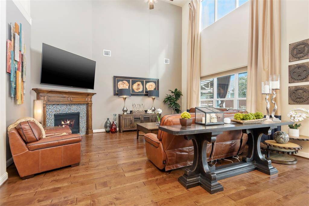 Sun drenched family room with a 2 story ceiling