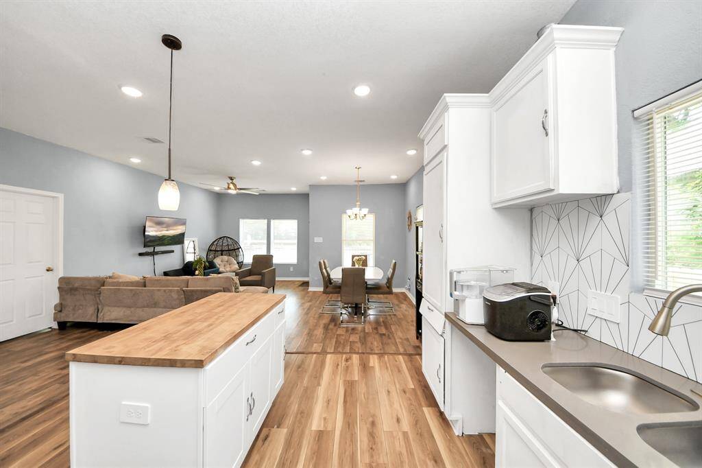 This 3 Bedroom, 2 Bath home offers open living concept with wood-like floors throughout. Stylish island kitchen with stainless appliances & decorative backsplash. Refrigerator, Washer & Dryer Included!. Close proximity to University of Houston, TSU, Midtown, Downtown, Eado and Medical Center. Easy access to I-69, HWY 288, I-45. Conveniently located near dining, shopping, museums, sports venues & entertainment!
