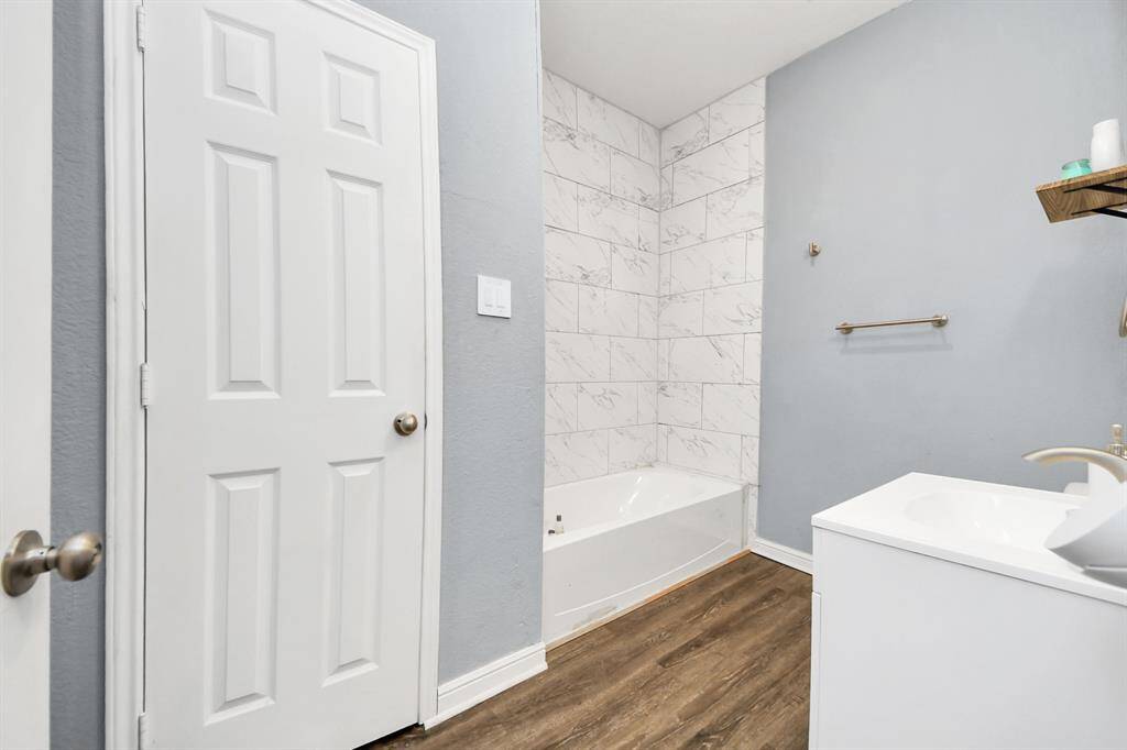Secondary Full Bath with Tub/Shower Combo.