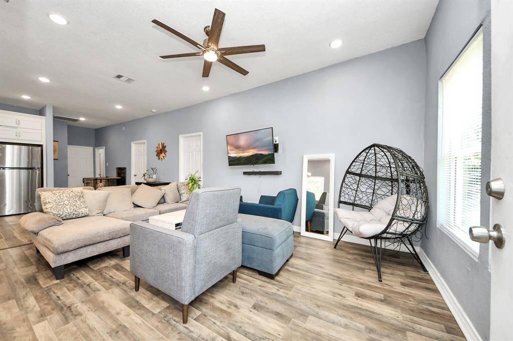 This 3 Bedroom, 2 Bath home offers open living concept with wood-like floors throughout. Stylish island kitchen with stainless appliances & decorative backsplash. Refrigerator, Washer & Dryer Included!. Close proximity to University of Houston, TSU, Midtown, Downtown, Eado and Medical Center. Easy access to I-69, HWY 288, I-45. Conveniently located near dining, shopping, museums, sports venues & entertainment!