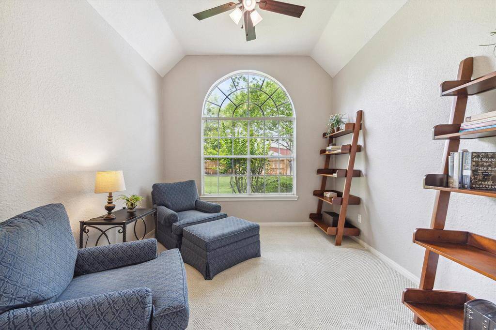 Sitting room located off of the primary bedroom. This could be a great office, gym, nursery...the possibilities are endless!