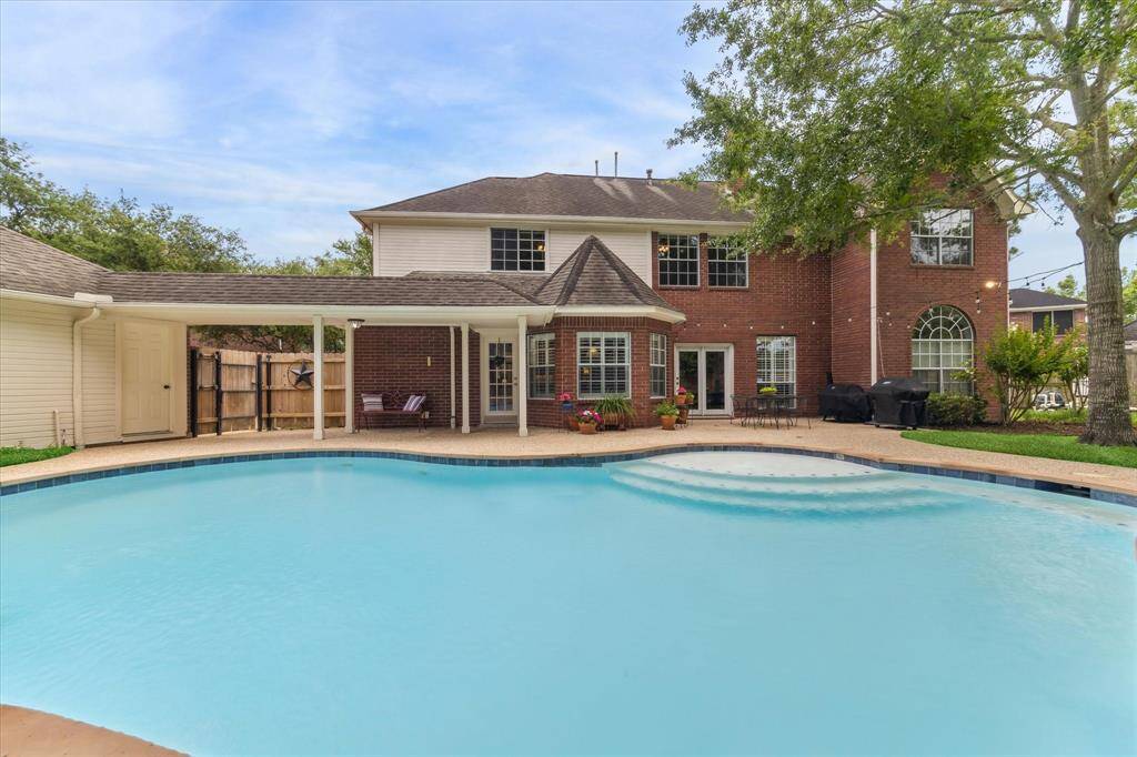The pool and hot tub are HUGE! Imagine entertaining in this space!