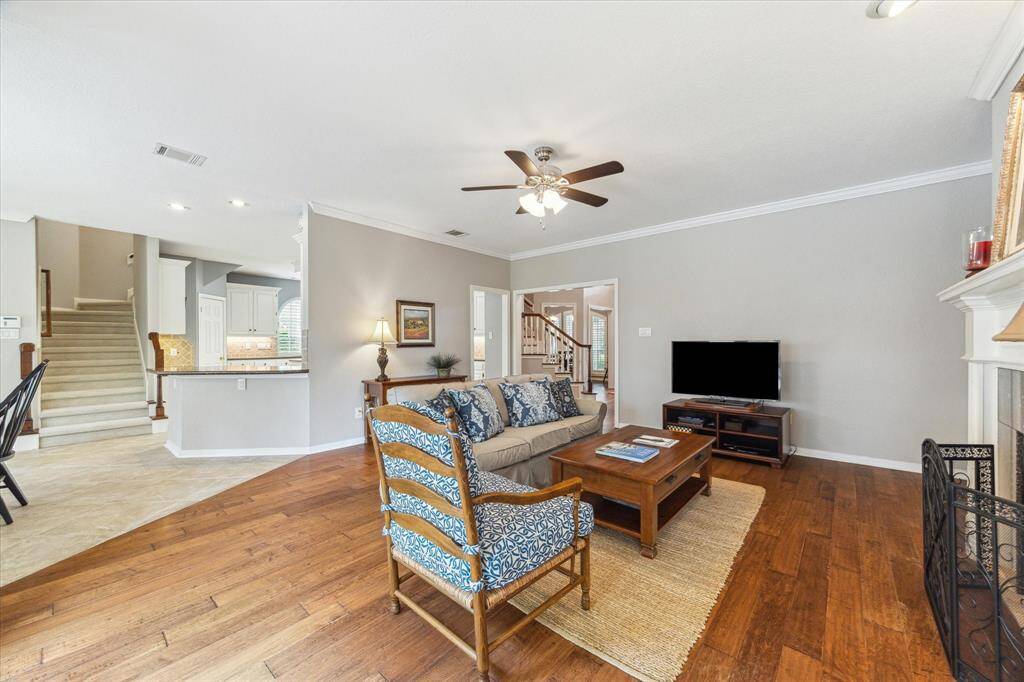 Living room opens into the breakfast room and kitchen