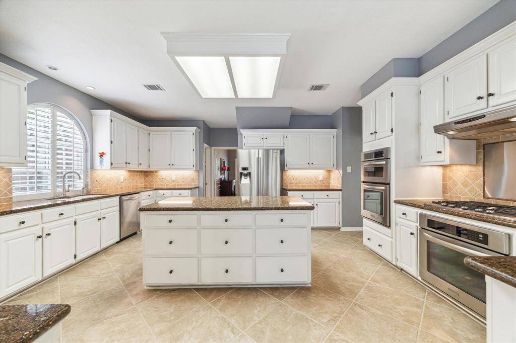 Large, bright kitchen with TONS of storage