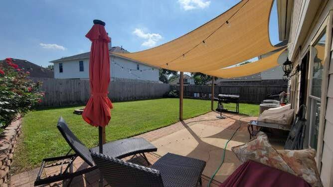 BEAUTIFUL PATIO AREA INCLUDES CANVAS CANOPY