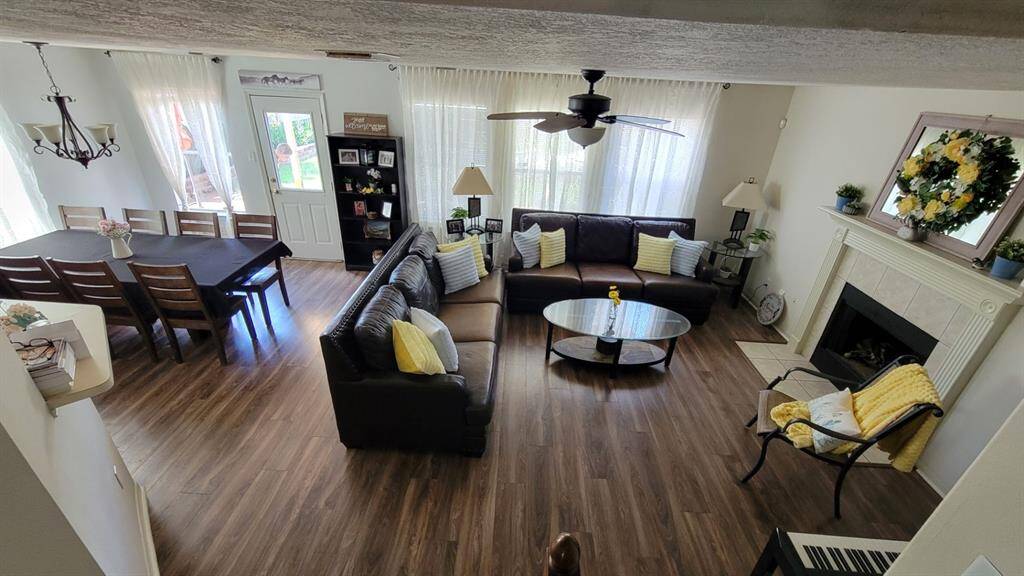 VIEW FROM STAIRS LOOKING TO FAMILY ROOM