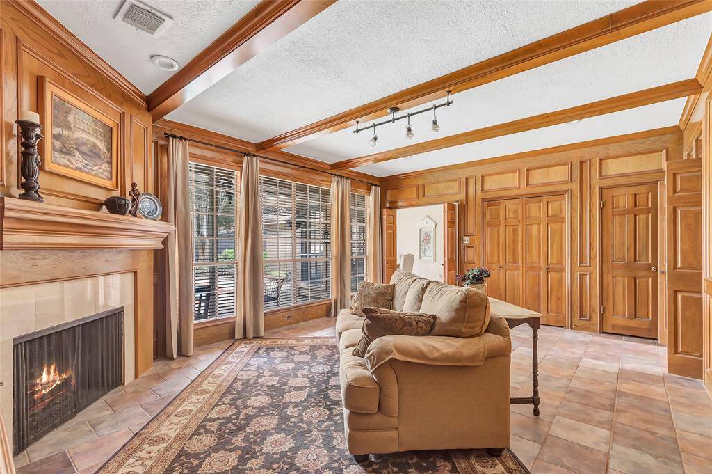One more view of the family room with fireplace and mantel.