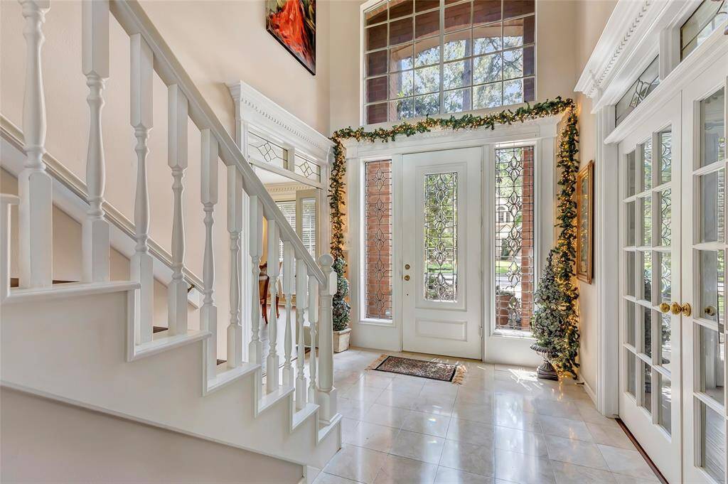 A beautiful view of the foyer and front entryway.