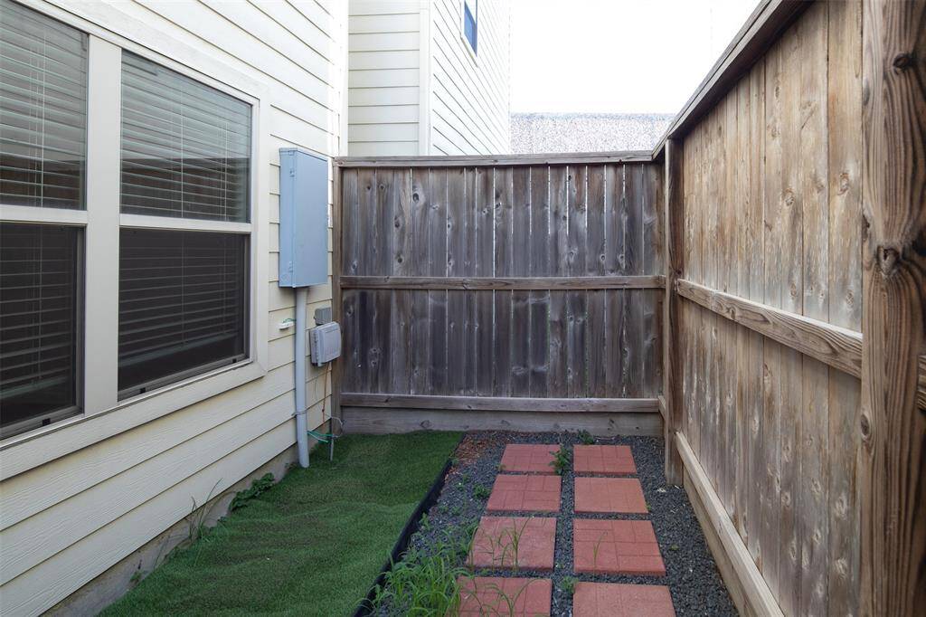 Outdoor patio - all hardscape and artificial grass, very low maintenance