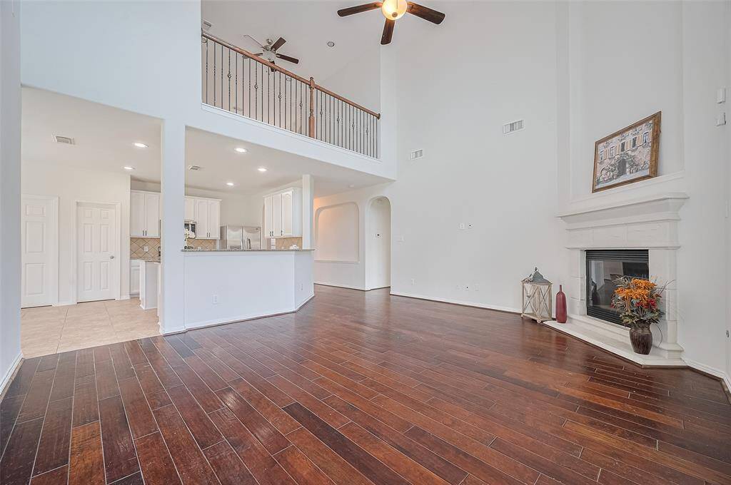The connected kitchen and dining space creates a harmonious flow, perfect for seamless transitions between meal prep and dining moments.