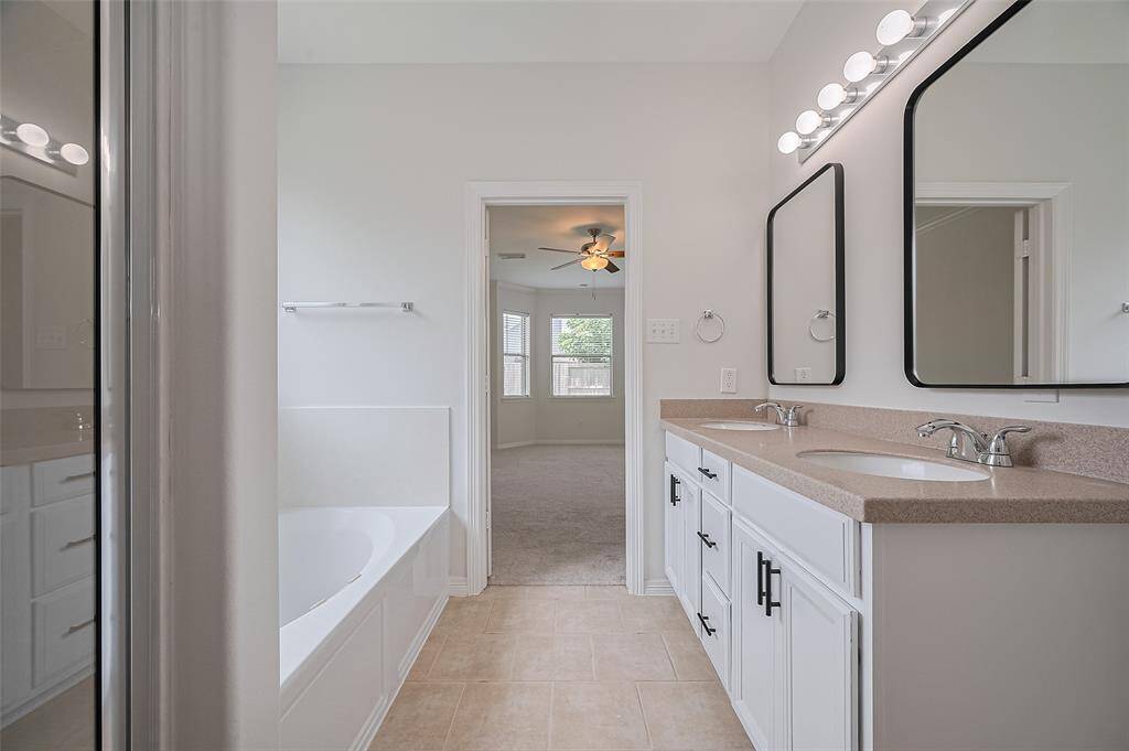 Upgraded Kohler mirrors enhance both style and functionality.