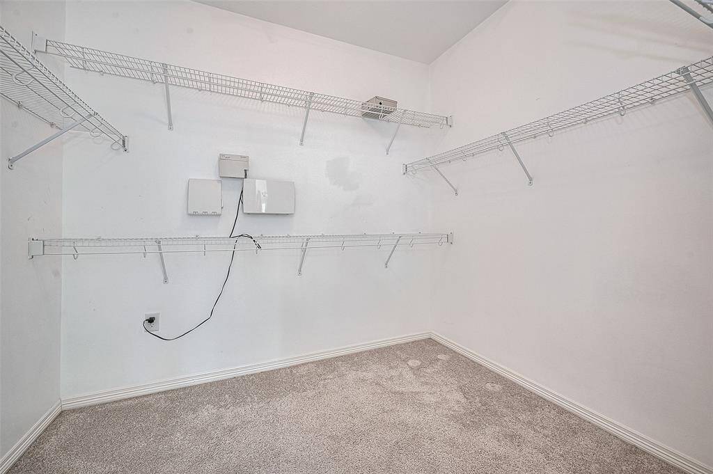 Designed to impress and built to last, this walk-in closet adds true value and everyday ease.