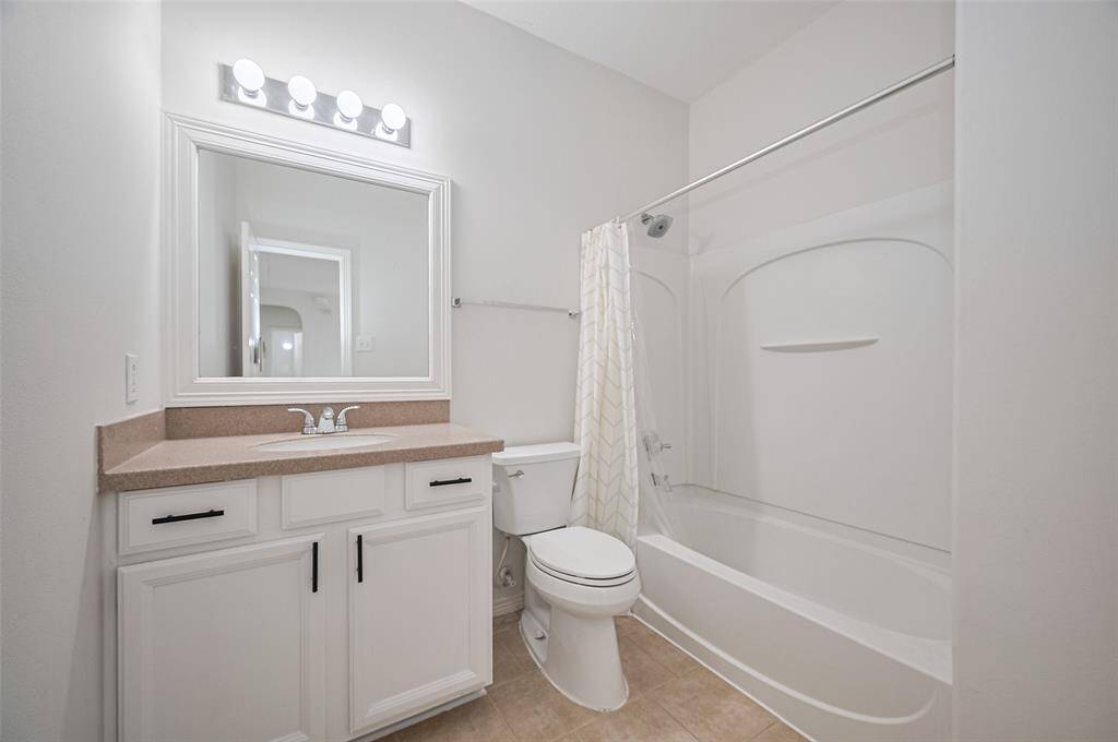 Classic tile flooring and fresh white walls for a timeless look.